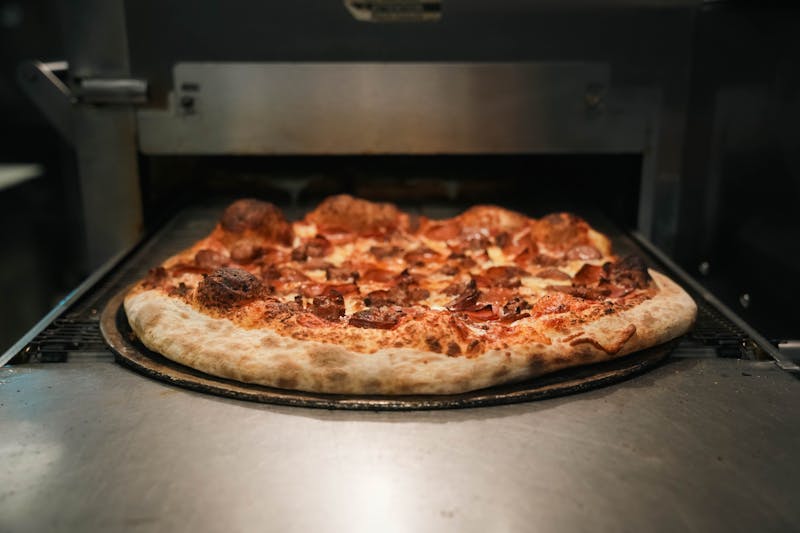 Pepperoni supreme pizza with golden crispy crust