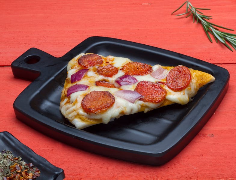 New York style pizza slice with stretchy cheese